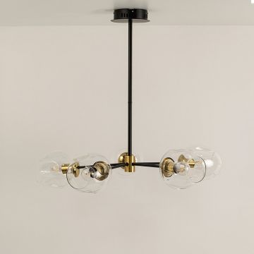 Black and gold chandelier displayed on white background with light off showing artistic symmetry and modern minimalist elegance.