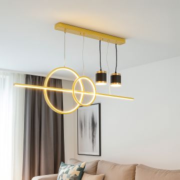 Gold pendant light with glowing rings and dual spotlights hanging above sofa for modern living room ceiling decor.
