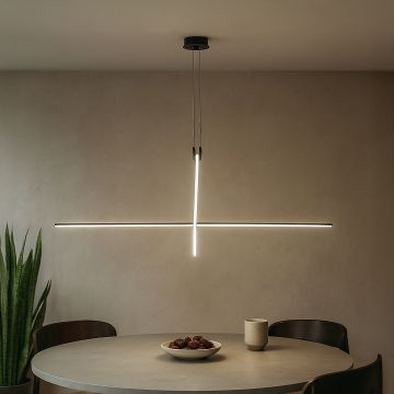 Slim black linear pendant light creating modern ambient lighting in a contemporary interior setting.