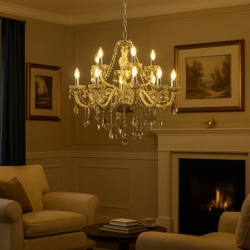 Golden crystal chandelier glowing warmly above seating area in living room with fireplace for luxury interior.