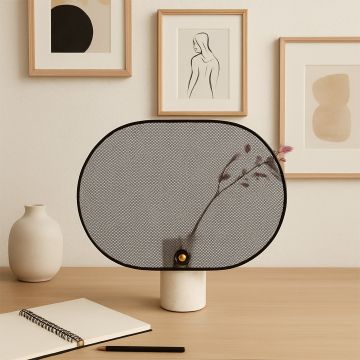 Modern decorative mesh screen with marble base styled on wooden desk adding elegance to contemporary interiors.