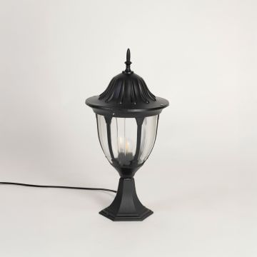 Black outdoor pillar lamp with dome top and clear glass panels designed for villa entrance garden patio and driveway lighting.