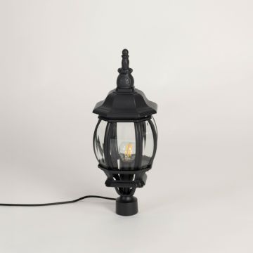 Black outdoor pillar lamp with clear rounded glass panels designed for villa entrance garden patio and pathway lighting.