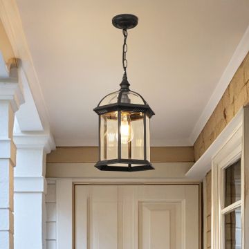Black dome hanging outdoor lantern light adding classic charm and soft glow to modern exterior spaces.