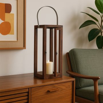 Tall wooden and glass lantern with metal handle perfect for living room or balcony decor adds warm rustic charm.
