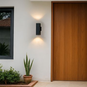 Modern rectangular black wall light enhancing the outdoor wall with minimalist design and soft balanced glow