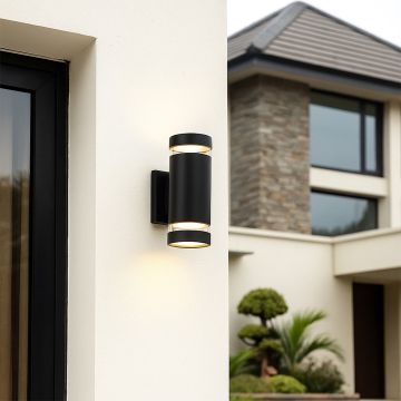 Modern black wall light adding sleek sophistication to contemporary interiors with focused illumination and minimalistic design.