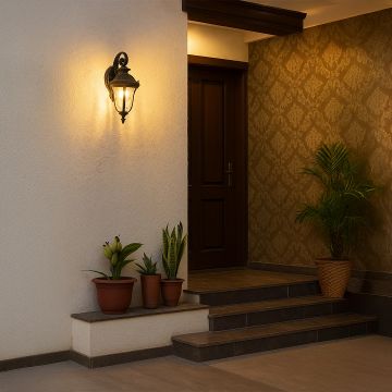 Elegant lantern wall light illuminating an outdoor entryway with a warm glow enhancing the home’s architectural beauty.
