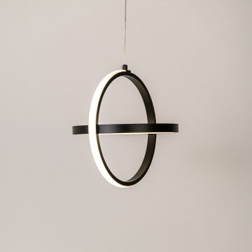 Black and white ring LED pendant light glowing softly on white background for modern living room kitchen island and home decor.