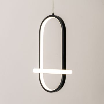 Modern black and white metal oval hanging light glowing softly on white background for stylish home wall decor.