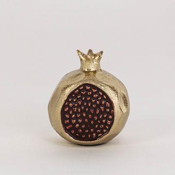 Golden pomegranate decor piece displayed on a clean white background highlighting its textured seed design