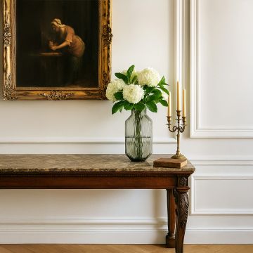Tall smoky gray textured glass vase styled in a modern living space adding elegance and a minimalist decorative touch.