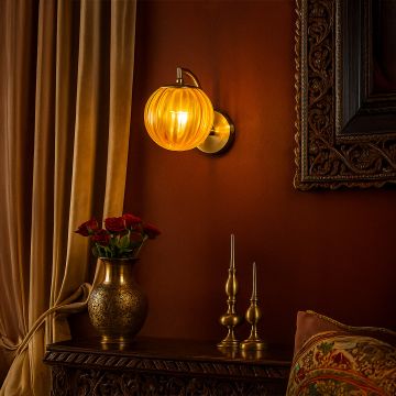 modern globe brass wall light gold main lifestyle