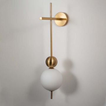 Wall sconce with white glass globe shade and gold metal base perfect for modern bedroom living room and hallway interiors.