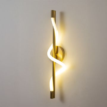 Gold metal wall light with white spiral tube glowing softly on white background for elegant modern wall lighting decor.