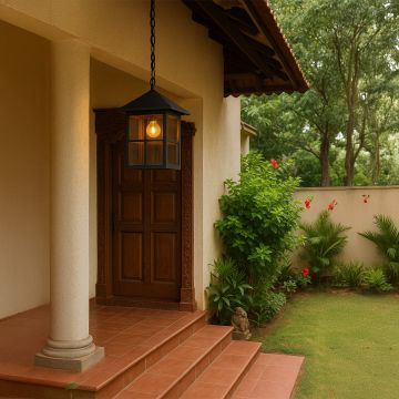 Black outdoor hanging lantern light adding timeless charm and ambient glow to outdoor spaces.