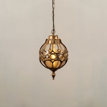 Illuminated black metal sphere pendant light with decorative cage design and warm bulb glowing against a plain white background.