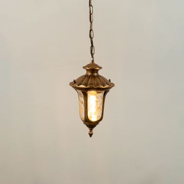 Gold metal outdoor hanging lantern light on with textured glass panels casting warm glow ideal for balcony patio pathway and entryway lighting Decor.