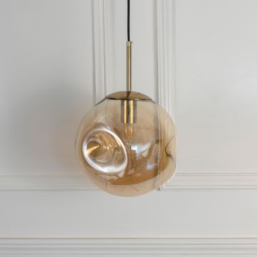 Amber glass pendant light with golden holder displayed on white background perfect for modern elegant interiors.