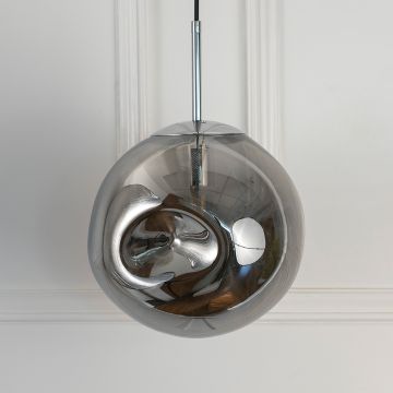 Smoky glass pendant light with sleek metal holder displayed on white background ideal for modern home interiors.