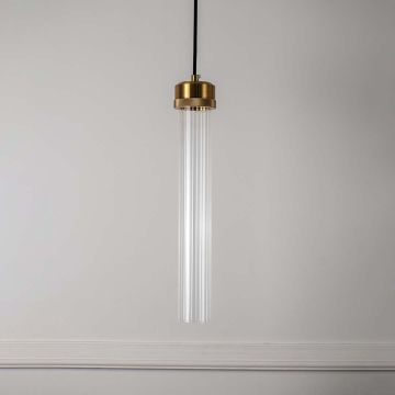 Sleek tubular glass pendant light with golden holder elegant modern ceiling lamp for kitchen dining and luxury home interiors.