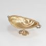 A hammered metal decorative bowl with raised pedestal base and ornate side handles displayed on a clean white background highlighting its textured metallic finish.