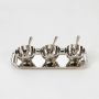 Three polished silver bowls with matching spoons arranged on a silver tray on a white background showcasing a clean minimal and premium presentation.