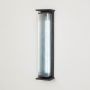 outdoor black steel solar wall sconce with clear lucite shade light on white background 1