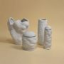Incomum White Ceramic Decorative Item Grouped
