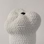 Closeup of Pebble vase showing detailed handcrafted texture resembling small pebbles for a sophisticated tactile appeal.