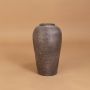 Brown rustic tall decorative vase shown on a clean white background highlighting its handcrafted textured finish for modern home decor.