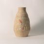 Hieroglyph vase displayed on white background showing engraved Egyptian-inspired motifs and smooth handcrafted texture.