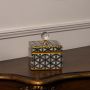 Square ceramic jar with black geometric flower pattern and crystal knob lid perfect for elegant home styling.